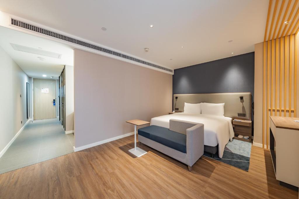 Postel nebo postele na pokoji v ubytování Holiday Inn Express Shanghai Expo Centre by IHG
