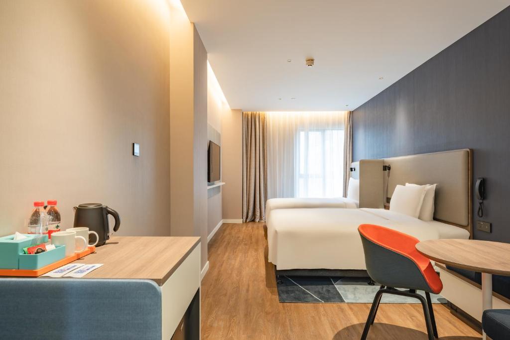 Postel nebo postele na pokoji v ubytování Holiday Inn Express Shanghai Expo Centre by IHG