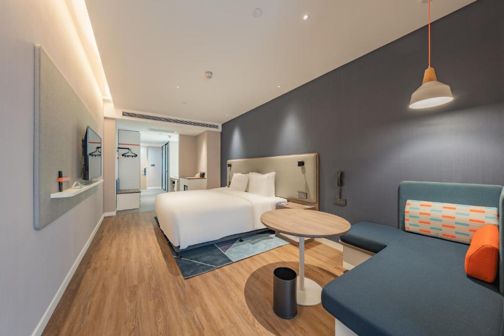 Postel nebo postele na pokoji v ubytování Holiday Inn Express Shanghai Expo Centre by IHG