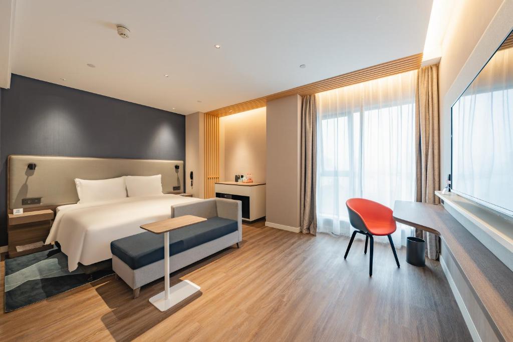Postel nebo postele na pokoji v ubytování Holiday Inn Express Shanghai Expo Centre by IHG