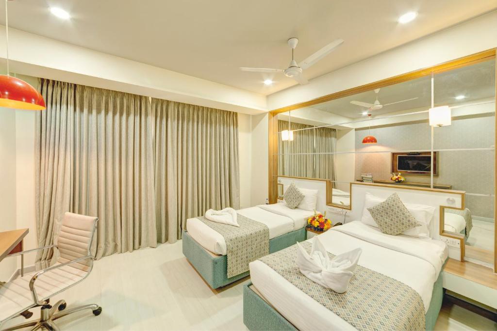 Posteľ alebo postele v izbe v ubytovaní ICON SELECT by Bhagini