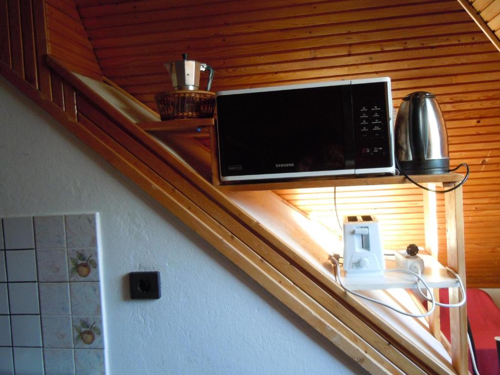 TV a/nebo společenská místnost v ubytování apartman-kata