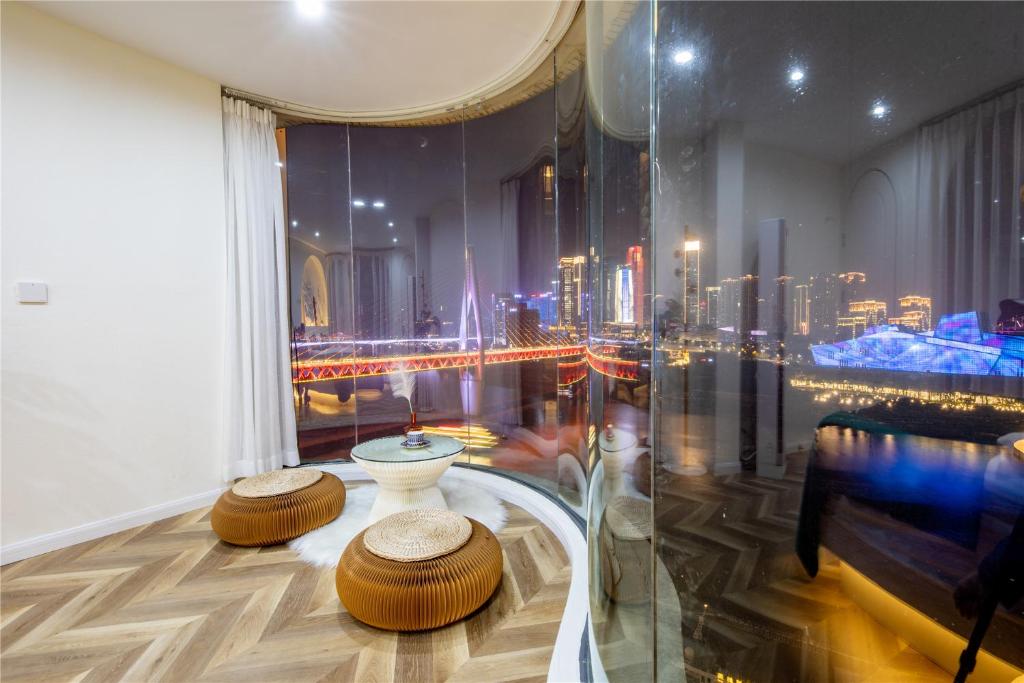 Posezení v ubytování Baihong Riverview Apartment-Hongya Cave