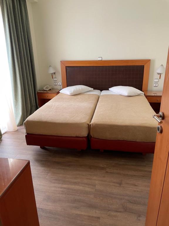 Postel nebo postele na pokoji v ubytování Athens Mirabello