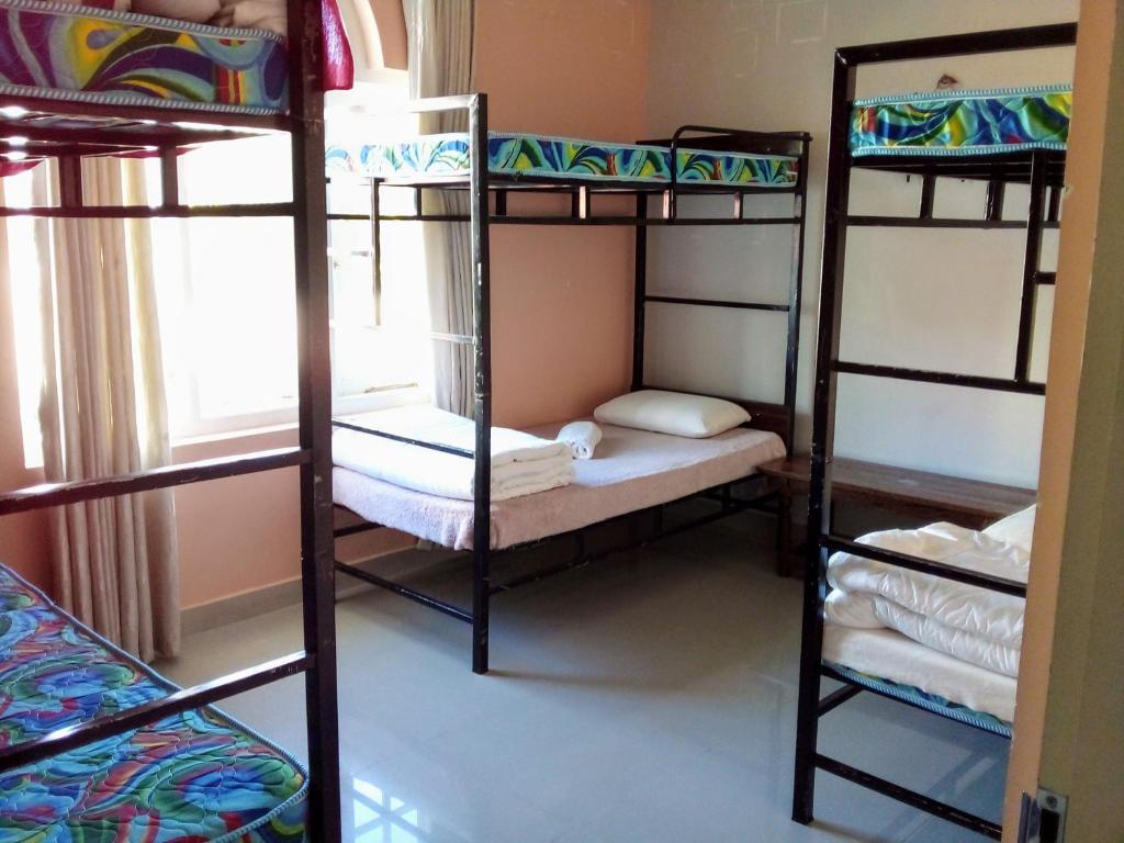 Postel nebo postele na pokoji v ubytování Vibe way (Hostel & Market farm)