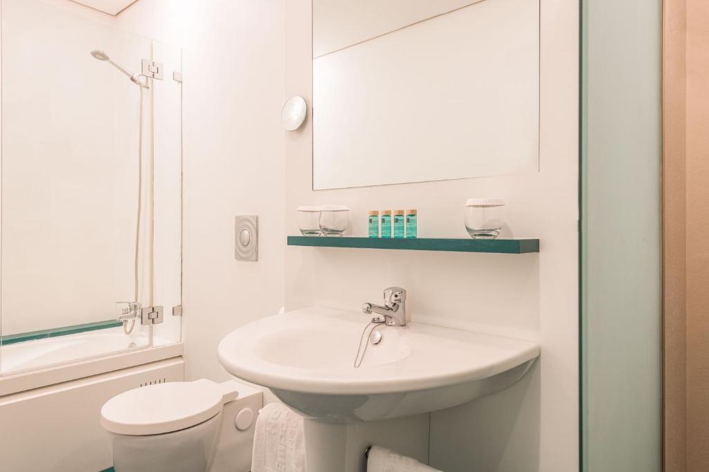 Kúpeľňa v ubytovaní Hotel Emporda