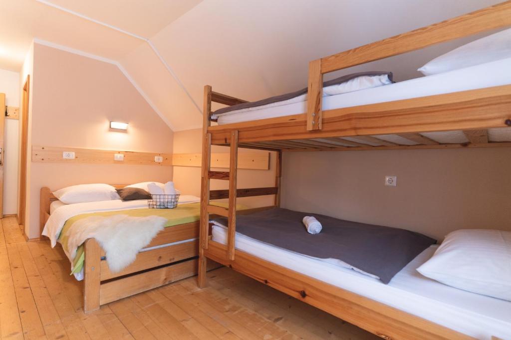 Postel nebo postele na pokoji v ubytování Brunarica