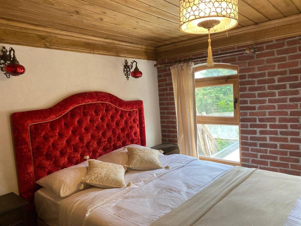 Postel nebo postele na pokoji v ubytování Sofia Konaklama