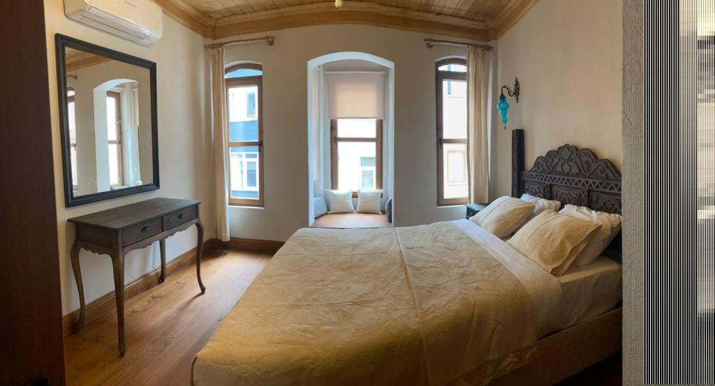 Postel nebo postele na pokoji v ubytování Sofia Konaklama