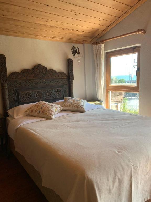 Postel nebo postele na pokoji v ubytování Sofia Konaklama