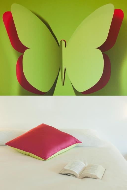 Postel nebo postele na pokoji v ubytování ibis Styles Bordeaux Saint Médard