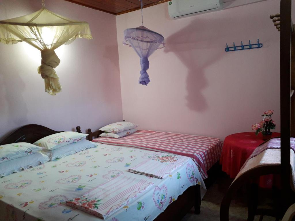 Postel nebo postele na pokoji v ubytování Guillet Beach Home