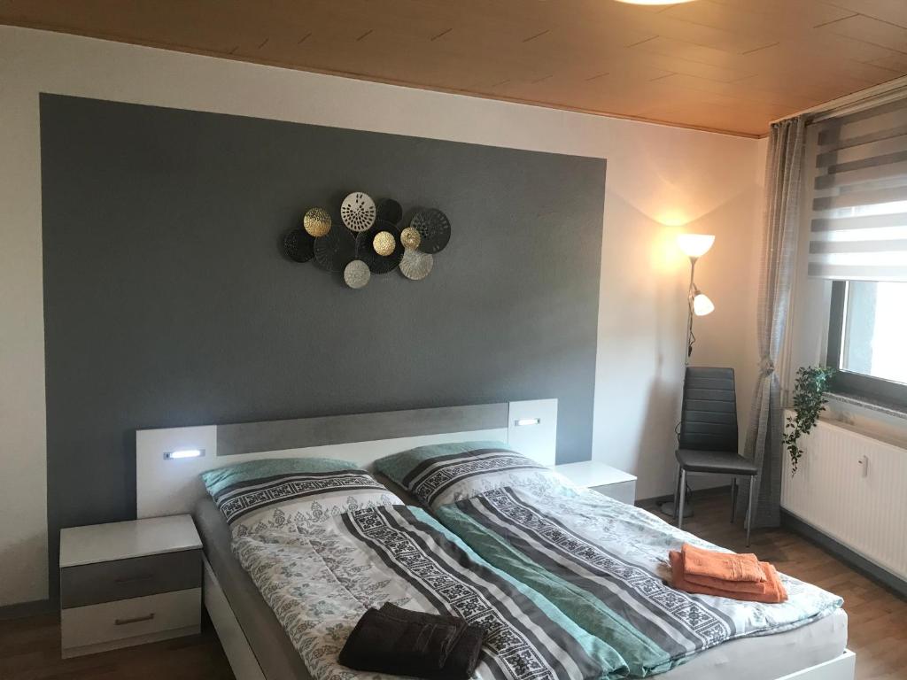 Postel nebo postele na pokoji v ubytování FeWo194-Mint Im Herzen von Adenau/Nürburgring