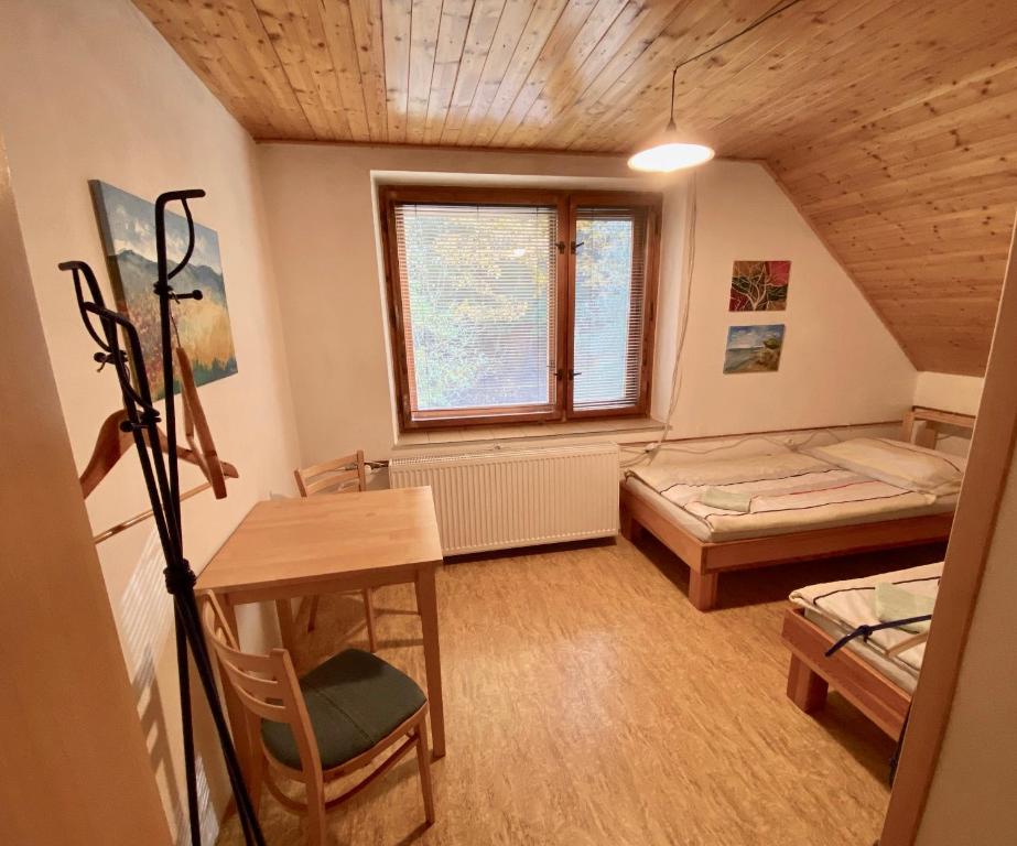 Postel nebo postele na pokoji v ubytování Ubytko Ivko