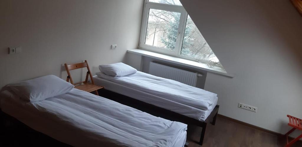 Postel nebo postele na pokoji v ubytování Rock'n'hostel