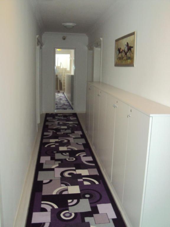 Postel nebo postele na pokoji v ubytování Teos Hotel