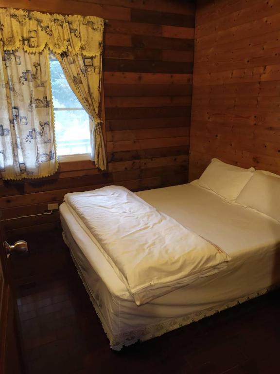 Postel nebo postele na pokoji v ubytování Peach Holiday Manoranor