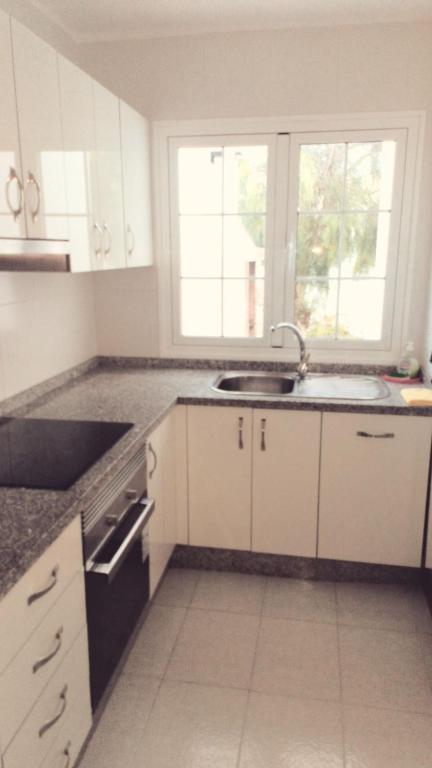 A kitchen or kitchenette at Casa Acqua