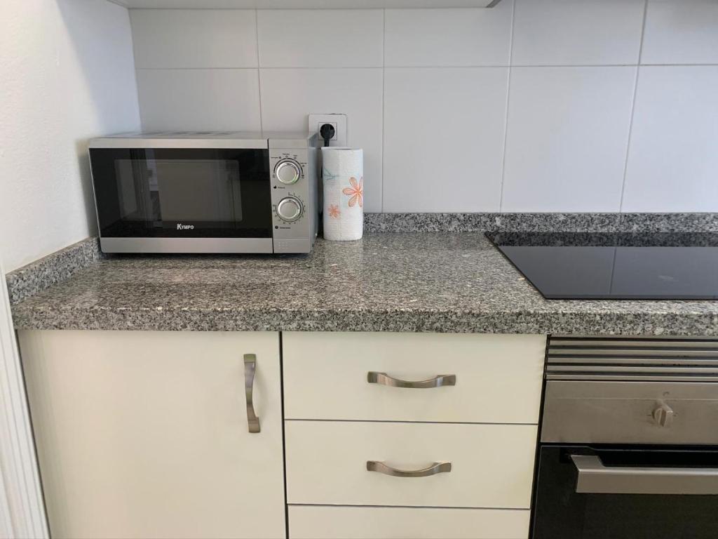 A kitchen or kitchenette at Casa Acqua