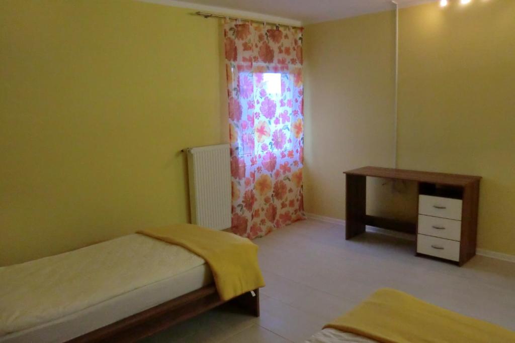 Postel nebo postele na pokoji v ubytování Gästezimmer Vogelsberg