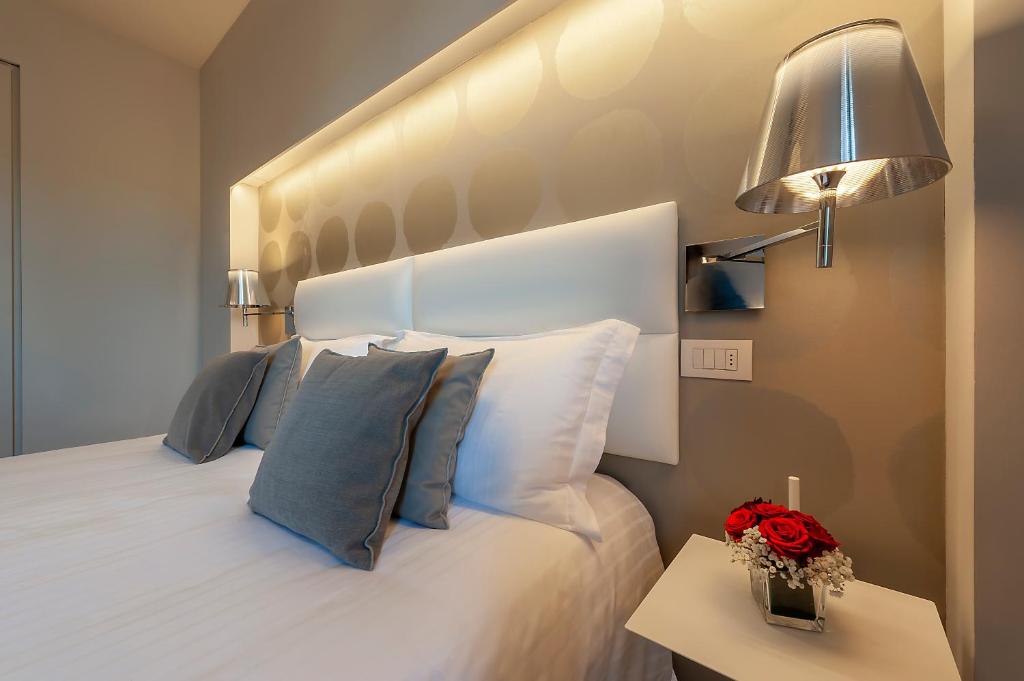 Postel nebo postele na pokoji v ubytování Hotel Monte Meraviglia