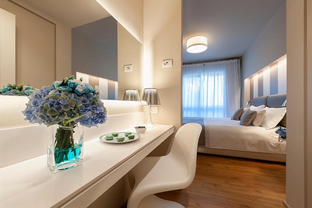 Postel nebo postele na pokoji v ubytování Hotel Monte Meraviglia