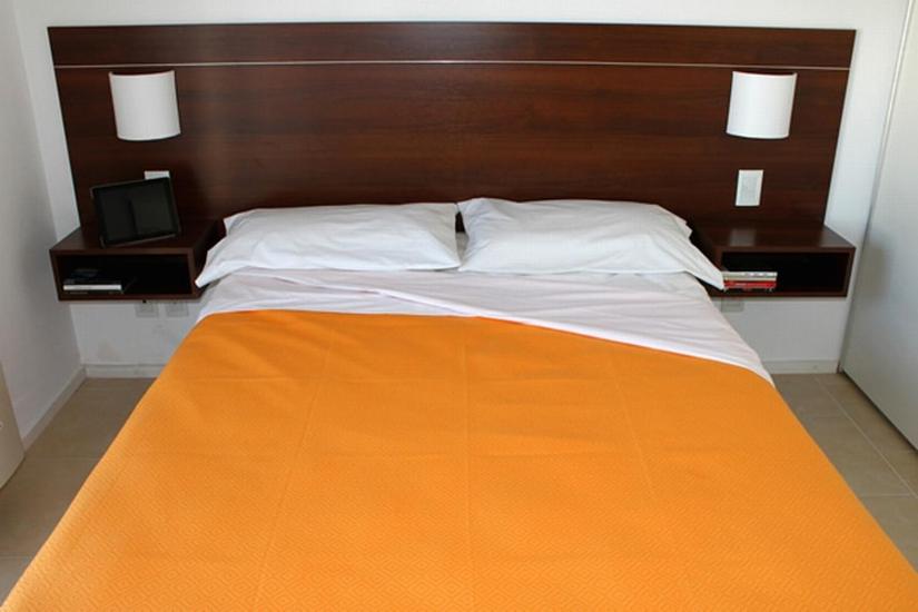 Postel nebo postele na pokoji v ubytování Altos de Maipu