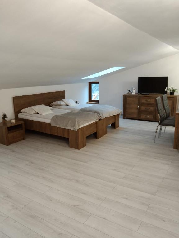 Posteľ alebo postele v izbe v ubytovaní Domek Mazury Harsz