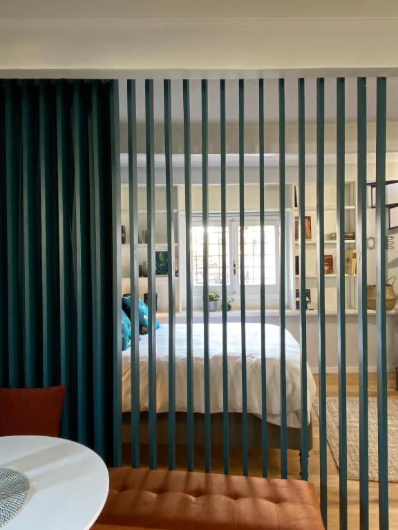 a bed in a crib in a room at Paradise Penthouse Suite Amazing View in Rome