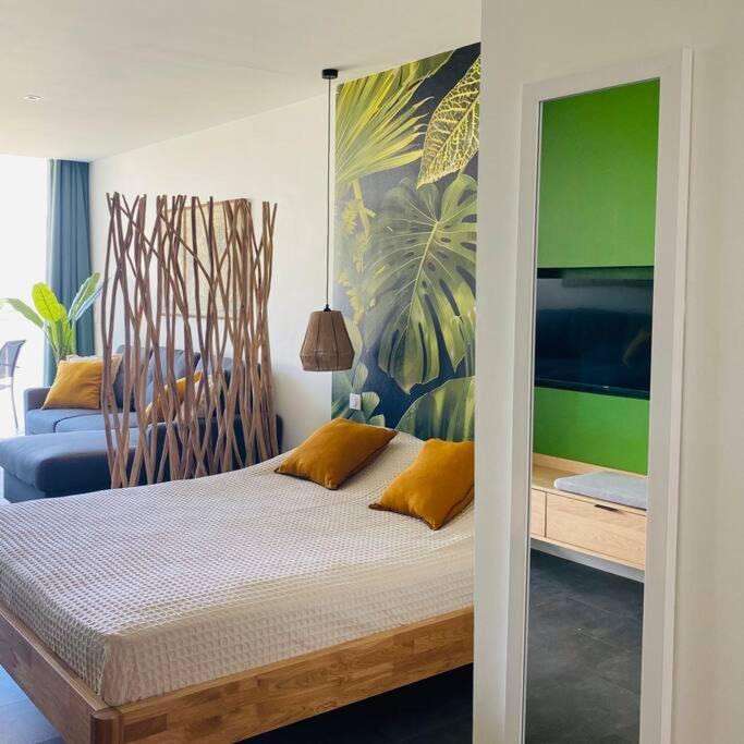 Photo de la galerie de l'établissement Studio tropical, beautifully renovated, sea view, à Anse-Marcel