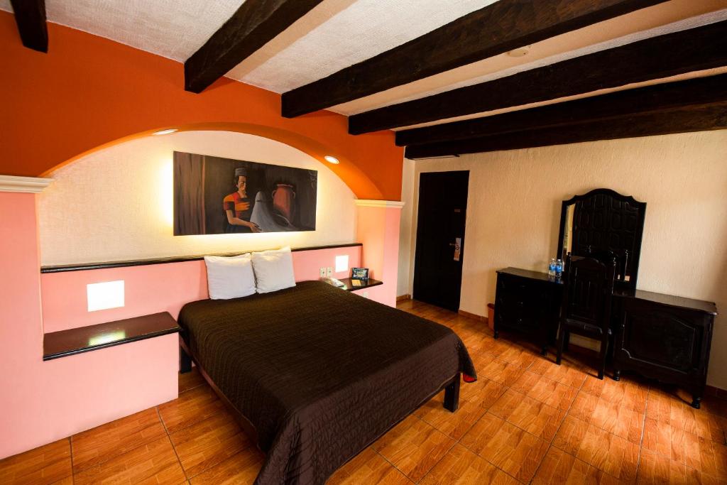 Postel nebo postele na pokoji v ubytování Hotel Catedral
