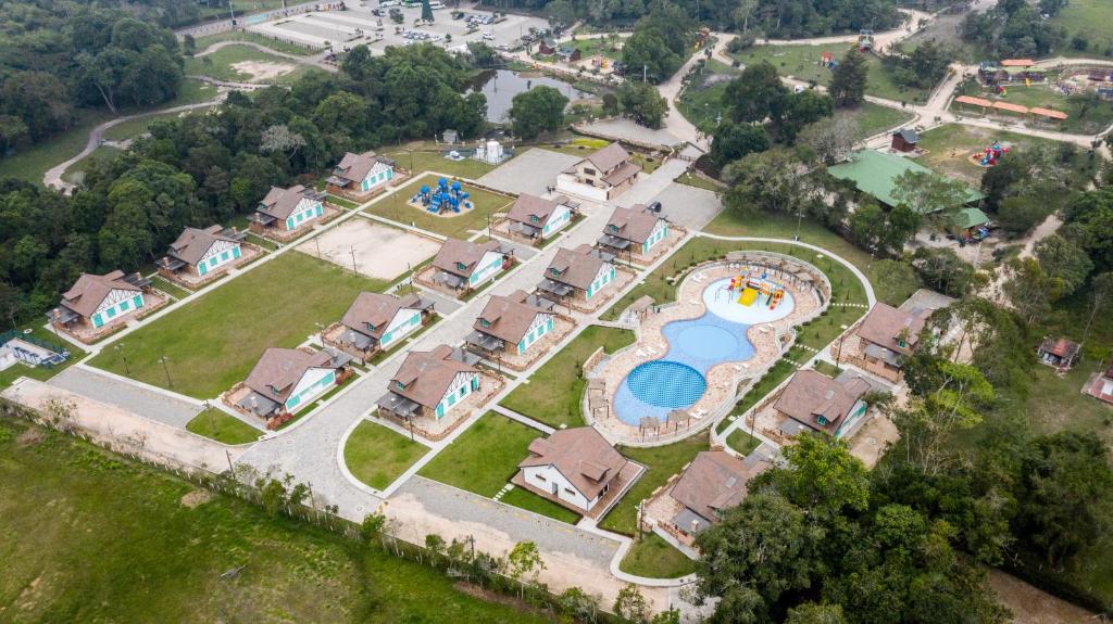 an aerial view of a house with a swimming pool at Hotel Mesa De Los Santos in Los Curos