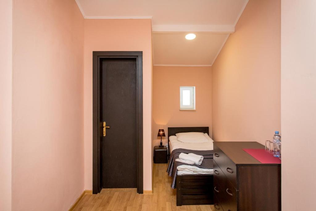 Postel nebo postele na pokoji v ubytování Hotel VERANDA
