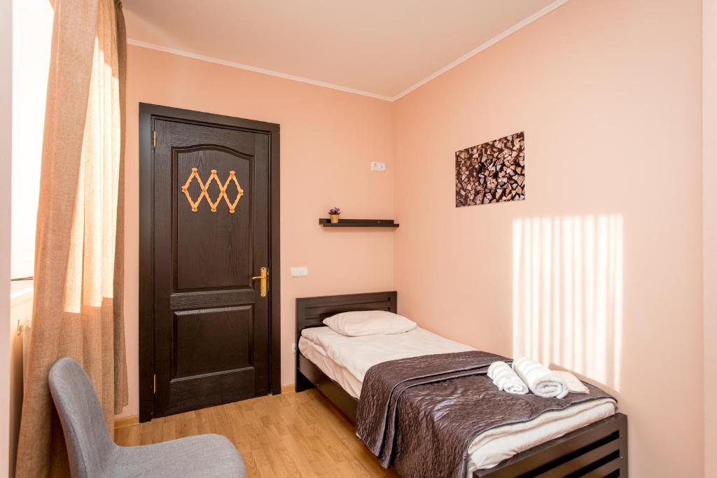 Postel nebo postele na pokoji v ubytování Hotel VERANDA