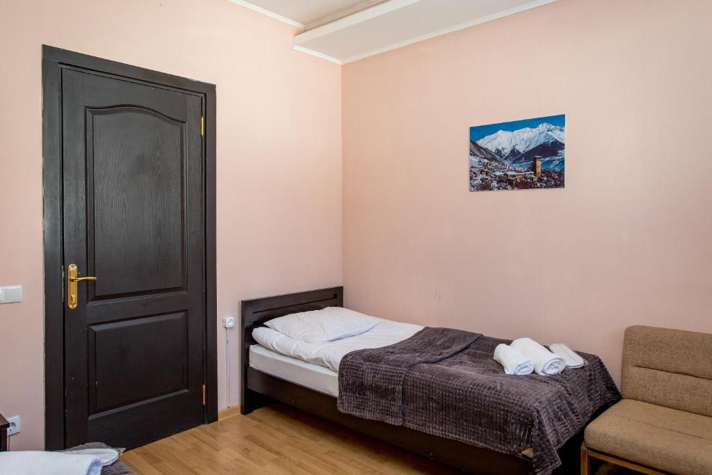 Postel nebo postele na pokoji v ubytování Hotel VERANDA