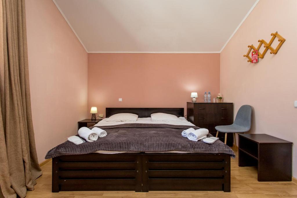 Postel nebo postele na pokoji v ubytování Hotel VERANDA