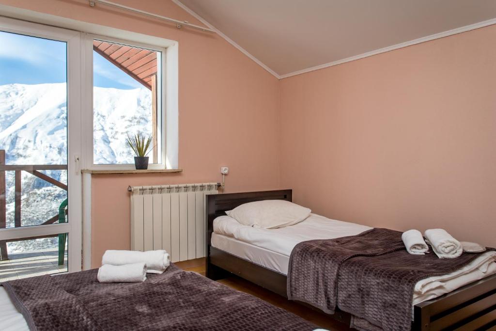 Postel nebo postele na pokoji v ubytování Hotel VERANDA