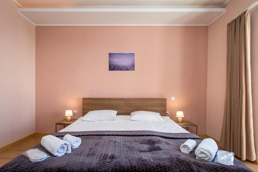 Postel nebo postele na pokoji v ubytování Hotel VERANDA