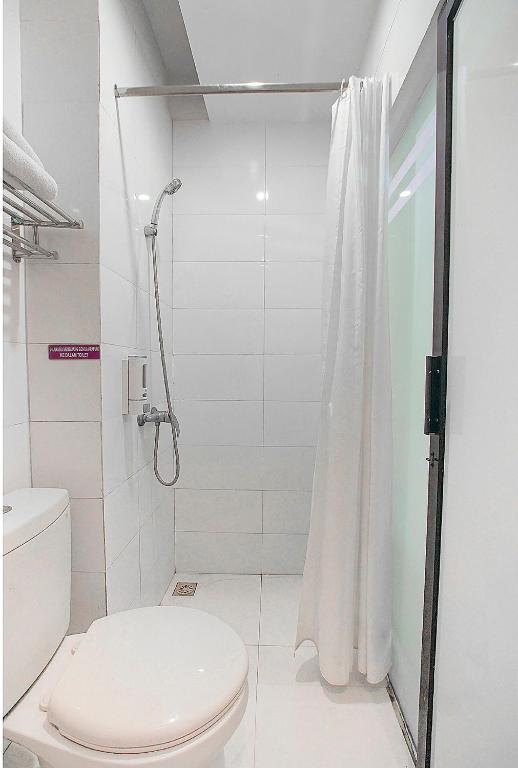 Sans Hotel FiFFa Premiere Malang - Suite Deluxe