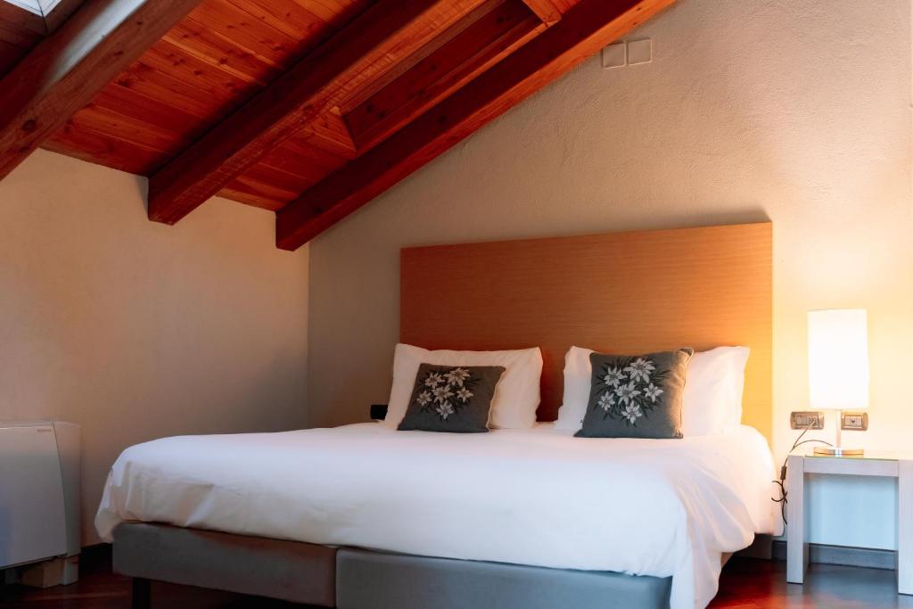 Postel nebo postele na pokoji v ubytování Savoia Resort