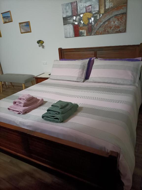 Postel nebo postele na pokoji v ubytování Bed and breakfast Raggio di Sole