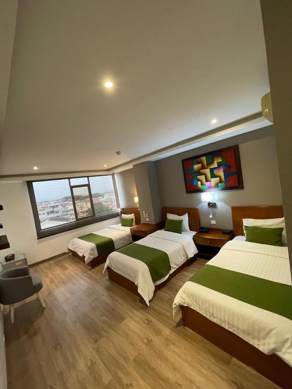 Postel nebo postele na pokoji v ubytování Hotel Plaza Monte Carlo