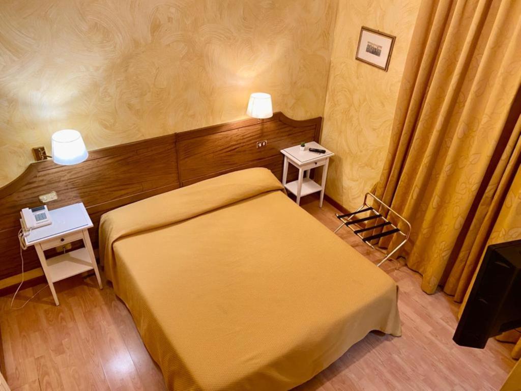 Postel nebo postele na pokoji v ubytování Sweet Dream Roma Termini