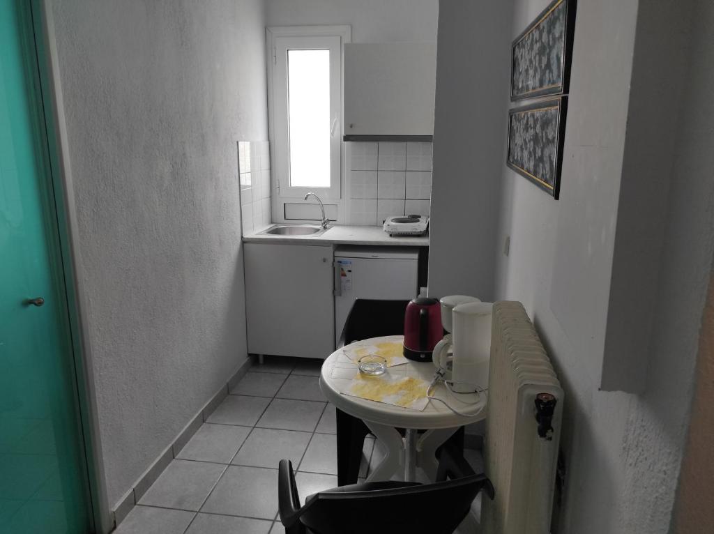 Kuchyň nebo kuchyňský kout v ubytování Villa Niki