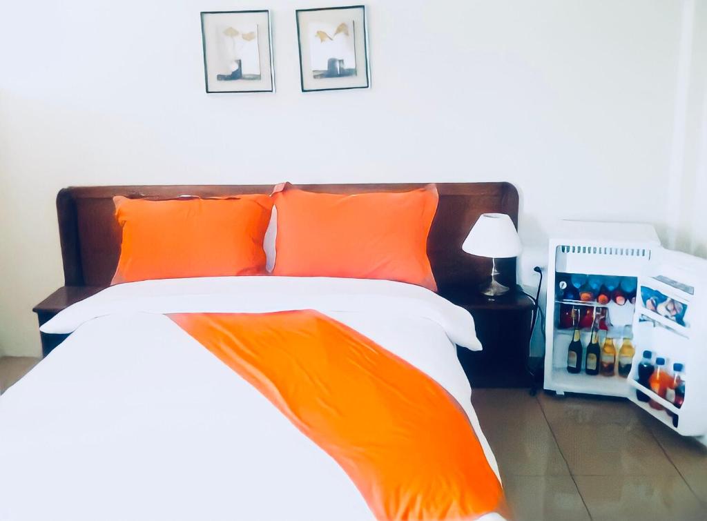 Postel nebo postele na pokoji v ubytování Hotel Madrigal