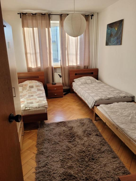 Łóżko lub łóżka w pokoju w obiekcie Apartament Cichy i Wygodny
