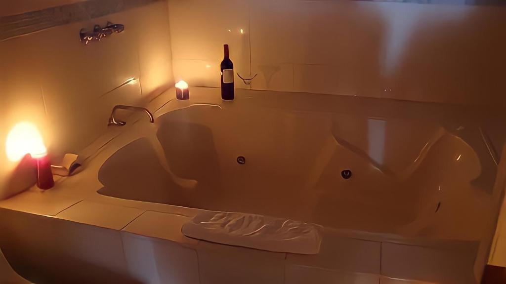 Koupelna v ubytování Hotel Madrigal