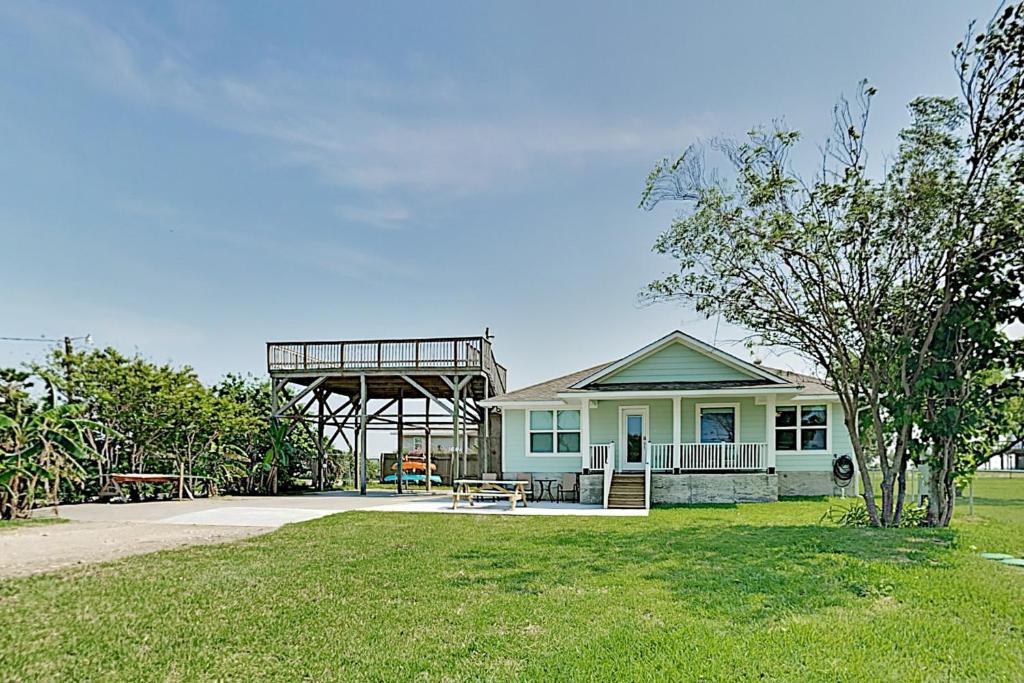 a house with a gazebo in a yard at Relaxed Beachin in Rockport