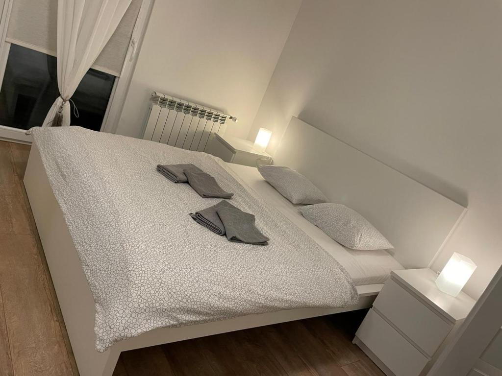 Postel nebo postele na pokoji v ubytování Apartmán v centre Michaloviec