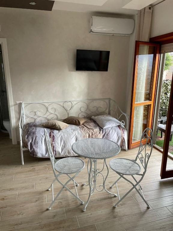 Posteľ alebo postele v izbe v ubytovaní B&B IL CAVALIERE